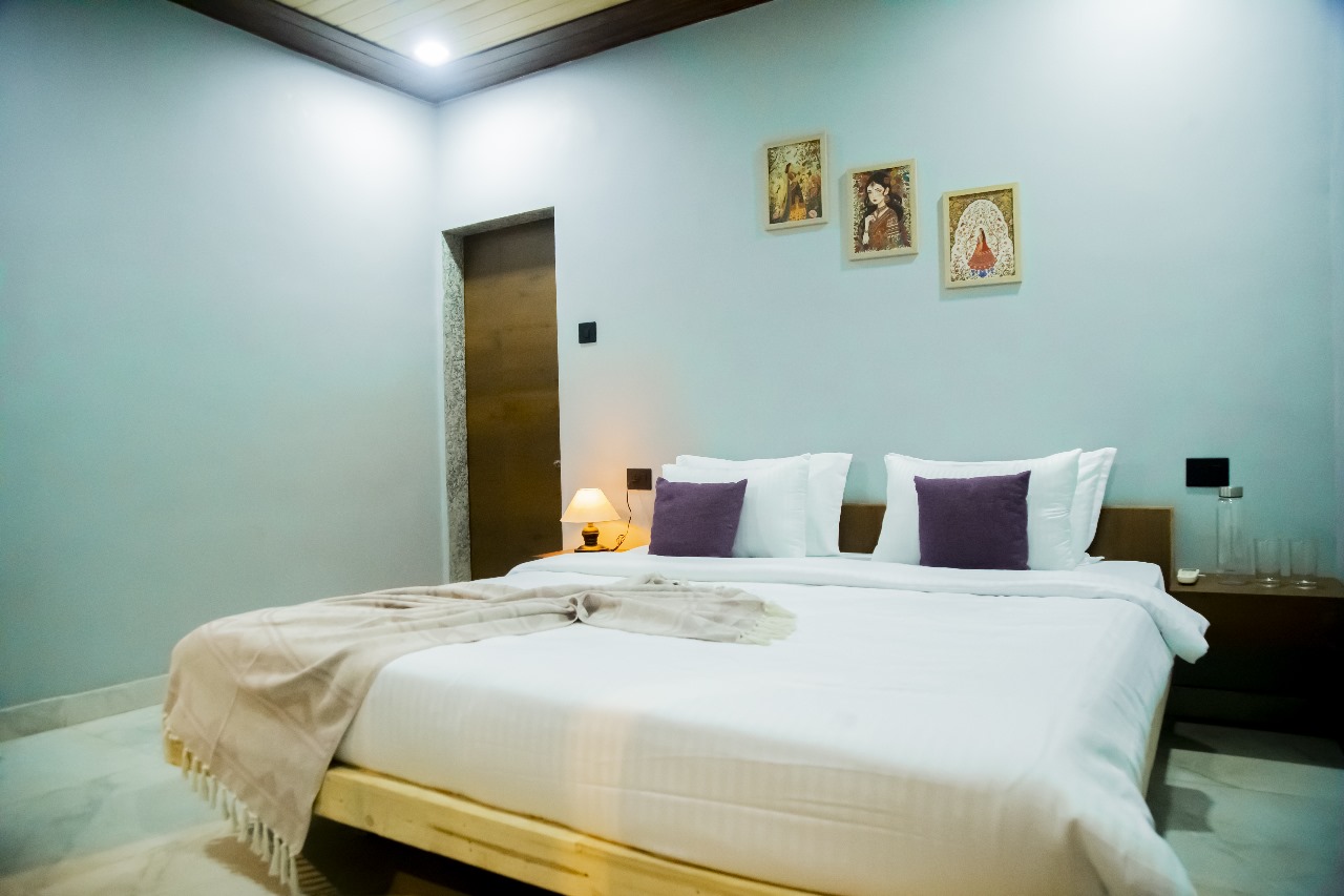 King size bed with ambient nightstand lighting